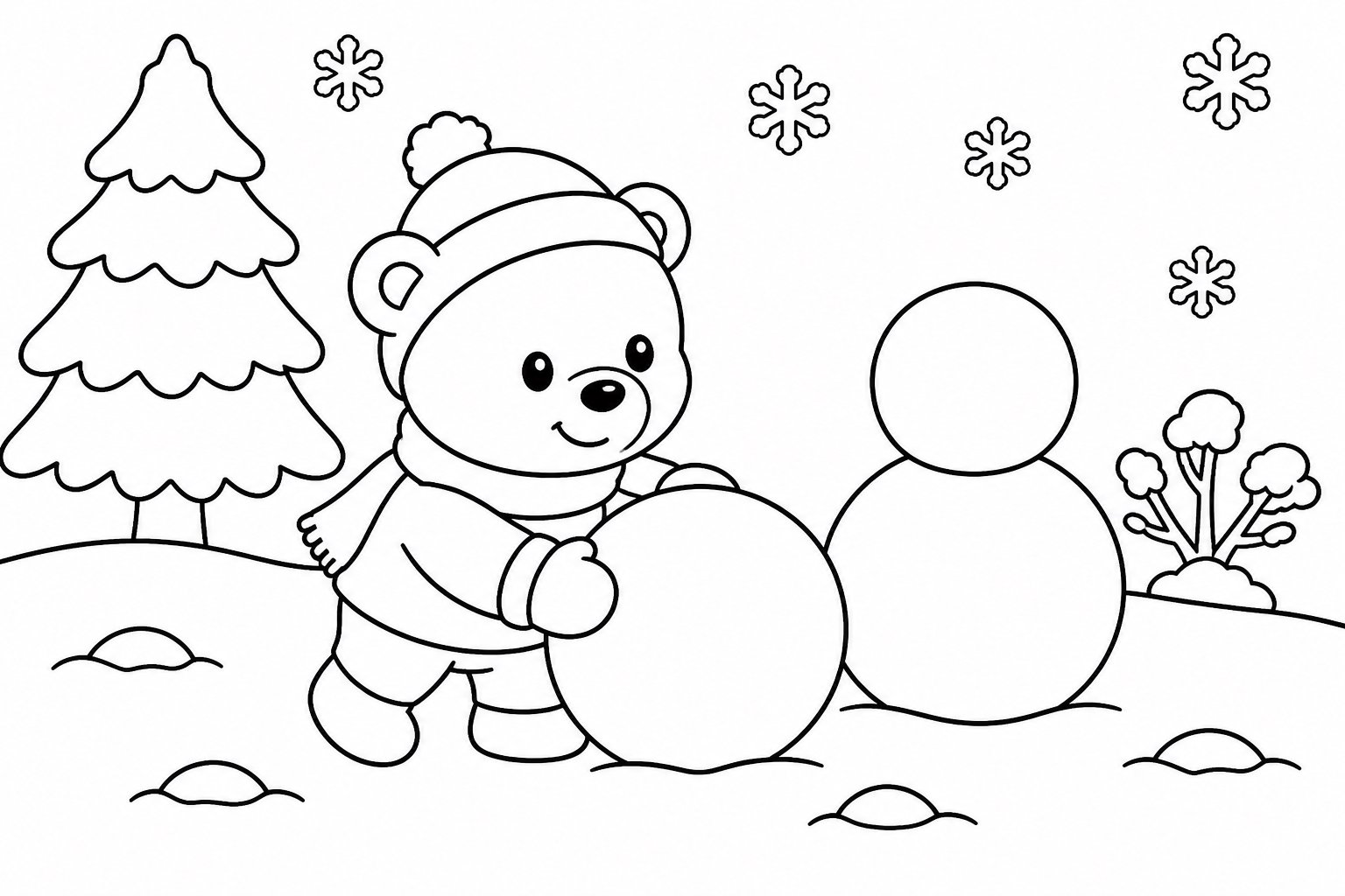 子グマが雪玉を作る
